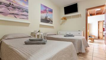 3 dormitorios, tabla de planchar con plancha, wifi gratis y ropa de cama