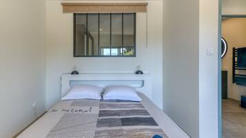 2 slaapkamers, een strijkplank/strijkijzer, gratis wifi, beddengoed