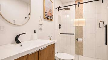 Shower, hair dryer, towels, soap