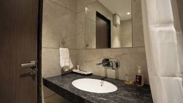 Shower, free toiletries, hair dryer, towels