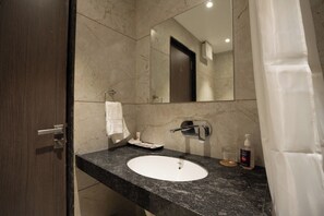 Shower, free toiletries, hair dryer, towels