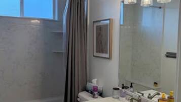 Hair dryer, towels, soap, toilet paper