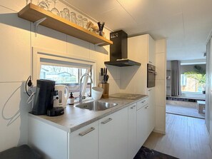 Microwave, stovetop, coffee/tea maker, electric kettle