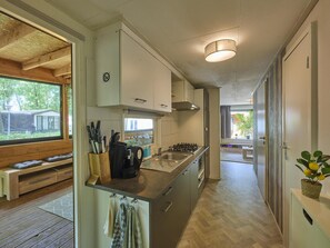 Microwave, stovetop, coffee/tea maker, electric kettle