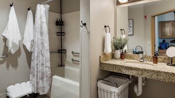 Hair dryer, towels, soap, shampoo