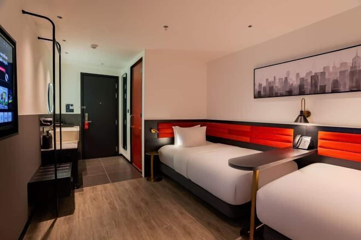 Desk, laptop workspace, free WiFi, bed sheets