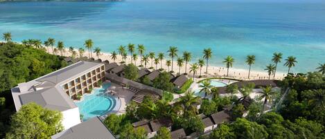 Outdoor pool, open 6:00 AM to 9:00 PM, pool umbrellas