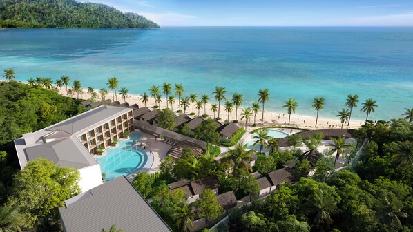 Een buitenzwembad en parasols bij het zwembad