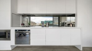 Coffee/tea maker, fridge, microwave, oven