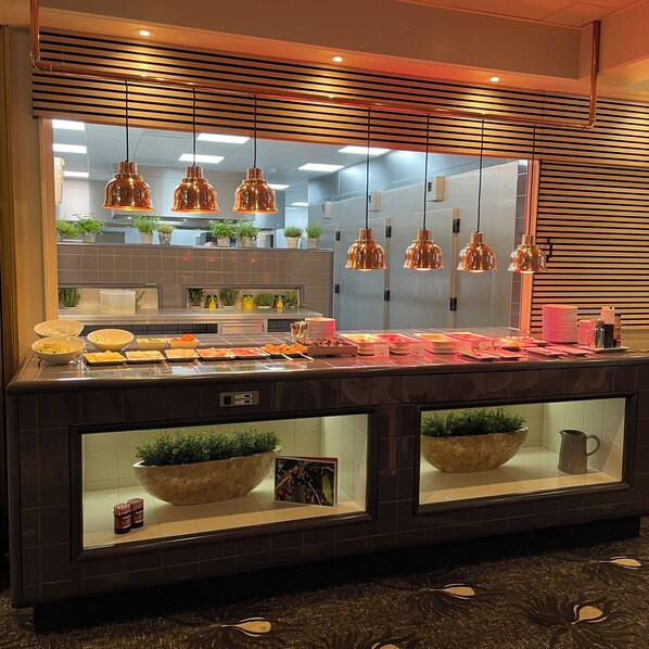 Enjoy a variety of food options at our central serving counter.