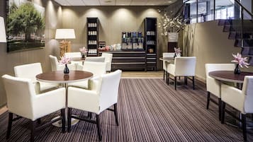 Relax in style with comfortable seating and a natural touch in our inviting lobby.
