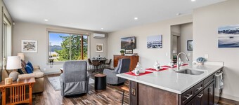 New Listing! Beautiful 3 bed, 2 1/2 bath river view home with hot tub & game room