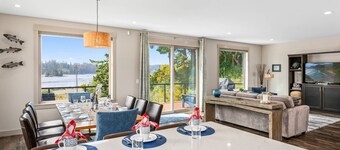 New Listing! Beautiful 3 bed, 2 1/2 bath river view home with hot tub & game room