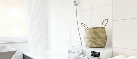 Hair dryer, towels, toilet paper
