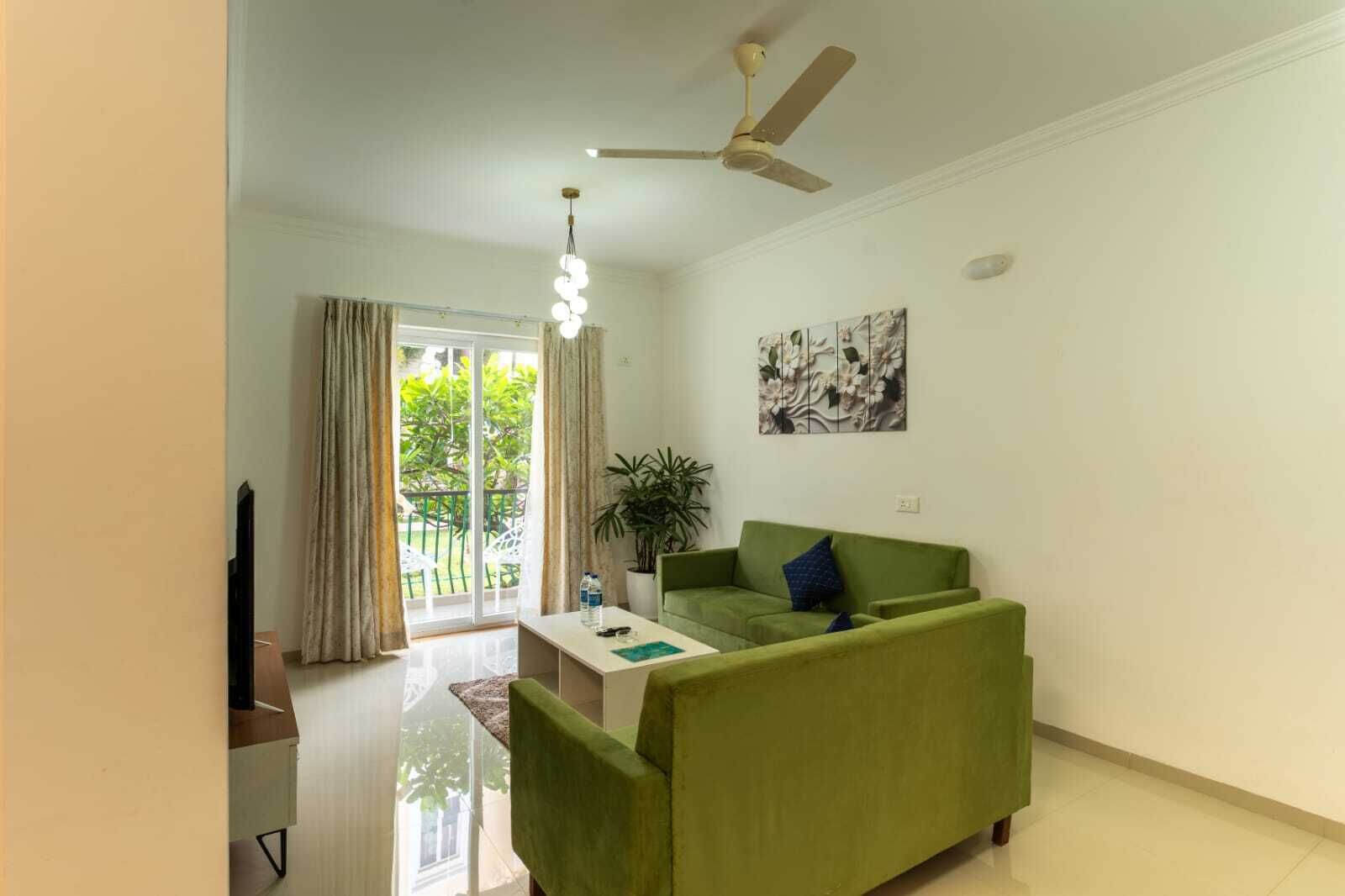 Departamento familiar, balcón | Área de sala de estar