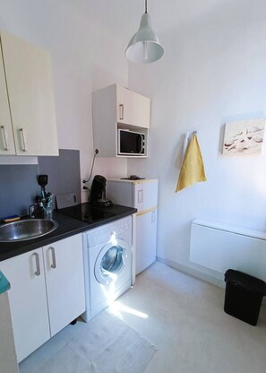 Fridge, microwave, coffee/tea maker, toaster