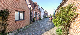 Appartement 'Lüddes Fischerhuus' avec terrasse privée, jardin privé et Wi-Fi