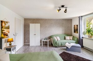 1 chambre, fer et planche à repasser, accès au Wi-Fi (inclus)