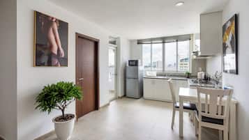 Apartment, 2 Bedrooms, Balcony, City View | Living area | Flat-screen TV
