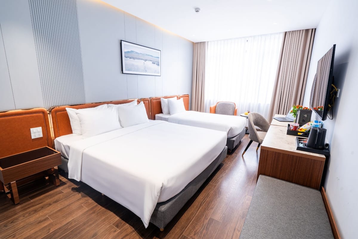 Family Triple Room | Premium bedding, minibar, in-room safe, desk