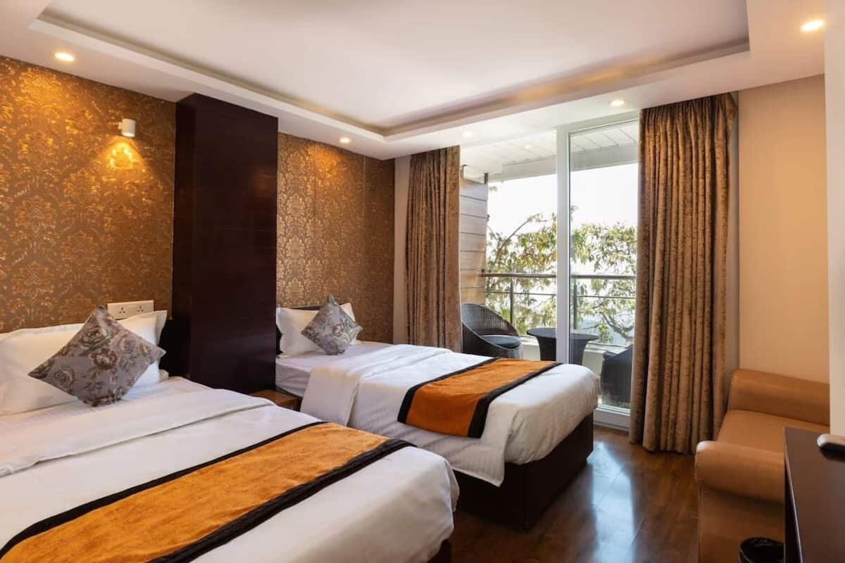 Espacio para trabajar con laptop, wifi gratis y ropa de cama