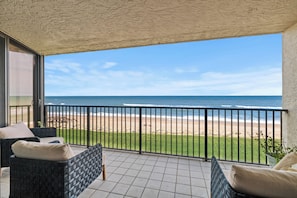 Property grounds - Welcome to this stylish 2BR/2BA condo in Chadham By the Sea on a peaceful no-drive beach. Enjoy sweeping ocean views from the open living, dining, and kitchen area, all designed to showcase the scenery, with a calming beach-themed interior. (New Smyrna Beach)