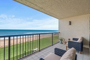 Property grounds - Welcome to this stylish 2BR/2BA condo in Chadham By the Sea on a peaceful no-drive beach. Enjoy sweeping ocean views from the open living, dining, and kitchen area, all designed to showcase the scenery, with a calming beach-themed interior. (New Smyrna Beach)