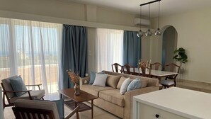 Studio Suite, 2 Bedrooms | Living area | 32-inch TV with digital channels - Villa Fleria Seaside Studios & Apts (Platanias)