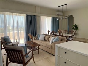 Studio Suite, 2 Bedrooms | Living area | 32-inch TV with digital channels - Villa Fleria Seaside Studios & Apts (Platanias)