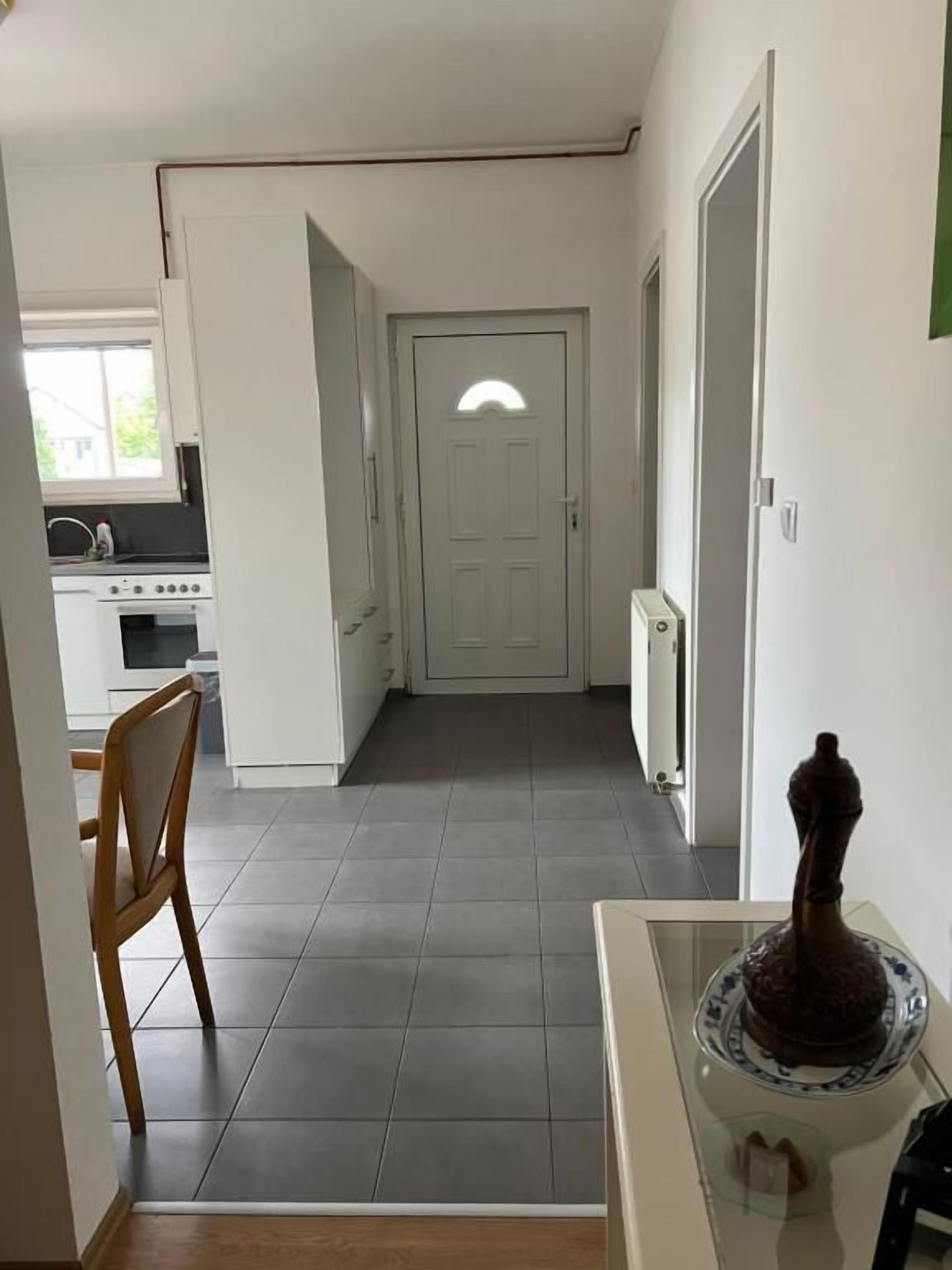 Departamento Deluxe, balcón | Área de sala de estar