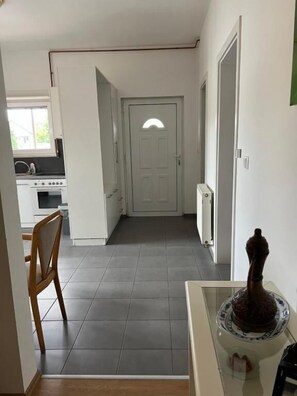 Departamento Deluxe, balcón | Área de sala de estar