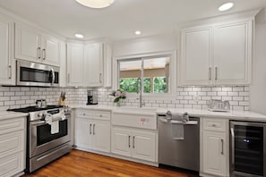 Fridge, microwave, oven, stovetop - New! Stylishly Renovated Home with Heated Pool | Easy Walk to St. Simons Village Charm (Saint Simons Island)
