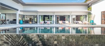 Elegant 4-bedroom villa with private pool, waterfall showers, and garden