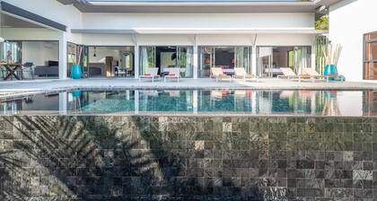 Elegant 4-bedroom villa with private pool, waterfall showers, and garden