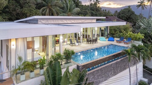 Luxurious 4-bedroom villa with sea, jungle views, infinity pool, and expansive terrace