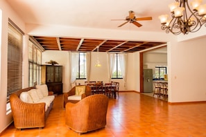Cozy living area with a large dining table and comfortable seating.