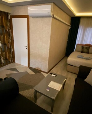 Standard Apartment, Balcony, City View | Free minibar, laptop workspace, blackout drapes, iron/ironing board - Lila Apart Otel (Izmir)