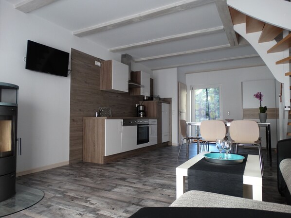 Fridge, stovetop, dishwasher, coffee/tea maker