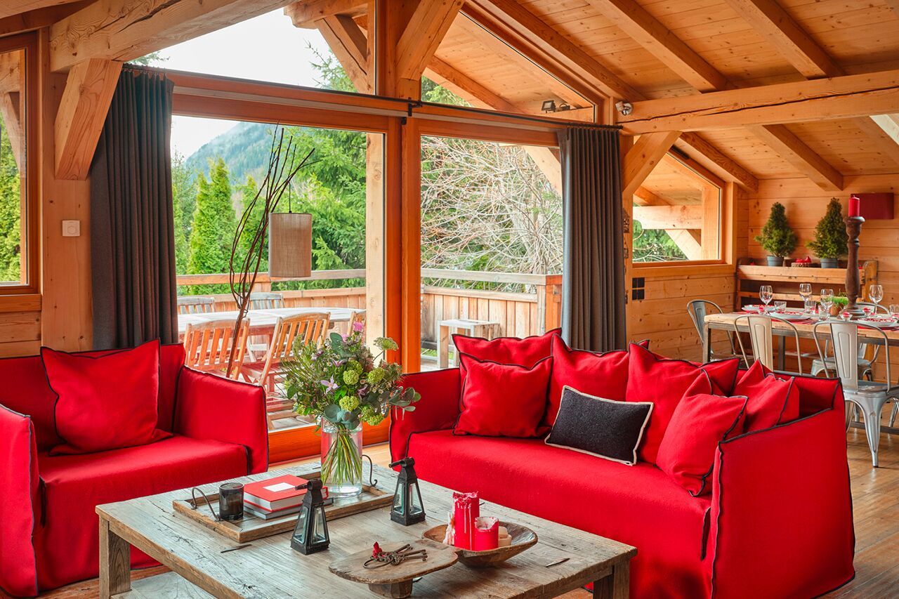 Luxury Chalet, 5 Bedrooms, Mountain View | Living area | 50-inch Smart TV with digital channels, fireplace, table football