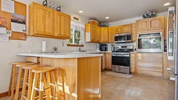 Réfrigérateur, four, plaque de cuisson, lave-vaisselle