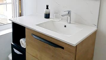 Hair dryer, towels, soap, toilet paper
