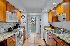 Microwave, stovetop, dishwasher, coffee/tea maker