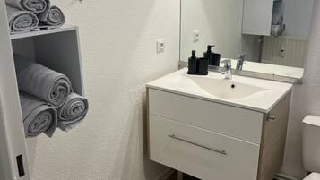 Hair dryer, towels, toilet paper