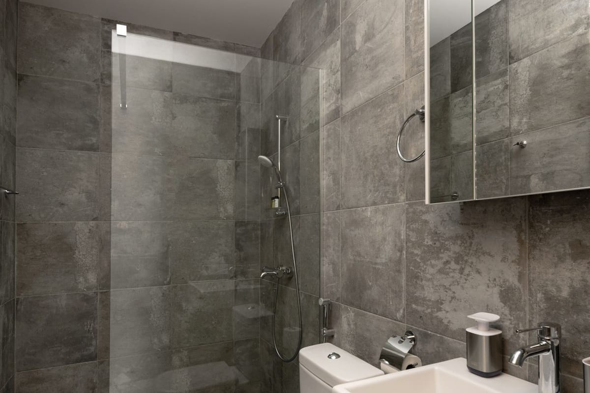 Standard Double Room, Garden View | Bathroom | Shower, hair dryer, slippers, towels