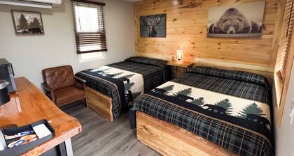 Escape to the tranquility of our cozy cabin inn, where rustic charm meets modern comfort. Experience a home away from home ambiance.