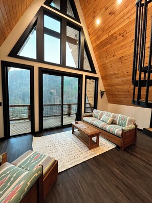 Living area - Mountain A-Frame with riverfront views (Burnsville)