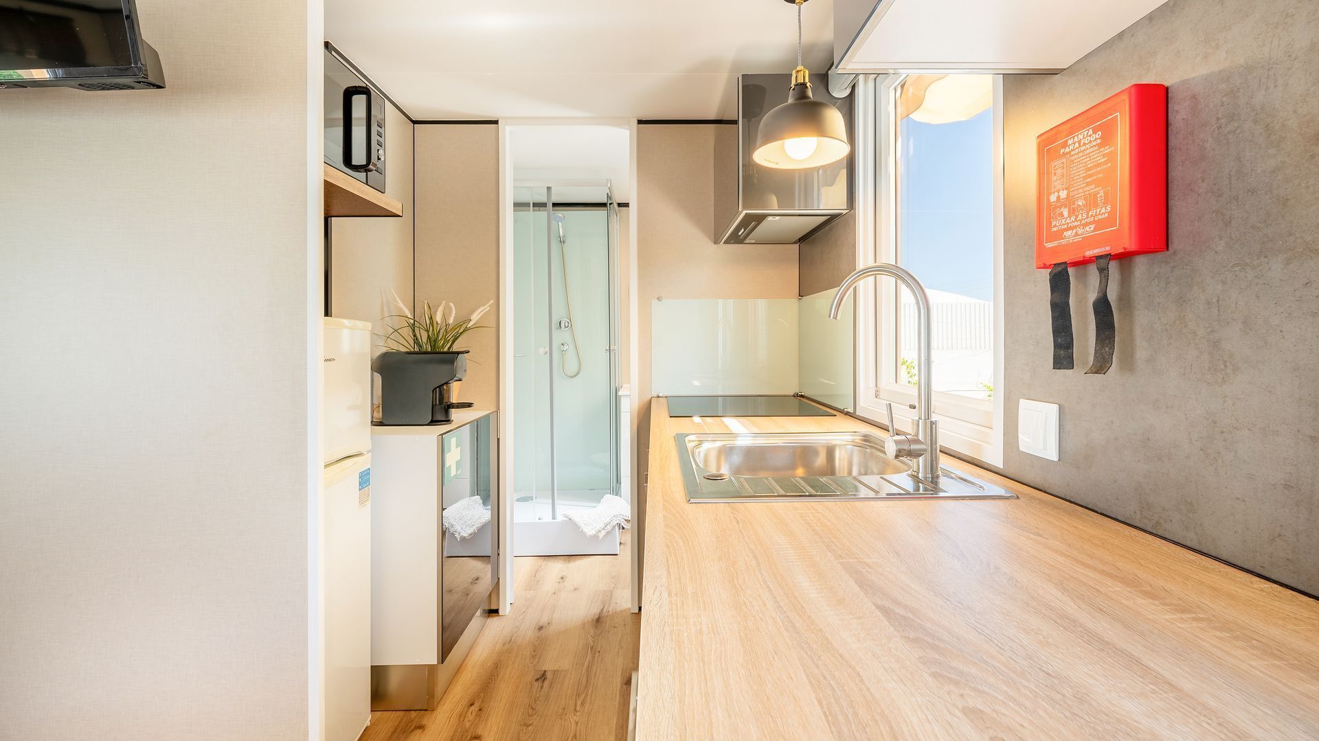 Fridge, microwave, stovetop, coffee/tea maker