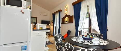 Apartment, 1 Schlafzimmer, Terrasse | Esszimmer