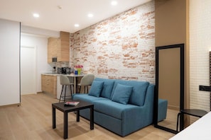 Deluxe Studio, Balcony | Private kitchen | Fridge, microwave, stovetop, coffee/tea maker