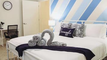 1 bedroom, desk, iron/ironing board, travel crib